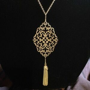 Art deco style w/ adjustable chain,necklace can be 20” or 28” pendant is 5”